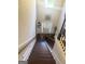 View of the foyer from the staircase, featuring high ceilings and stylish entryway decor at 1869 Schofield Dr, Hampton, GA 30228