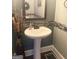 Powder room features an unique round sink and decorative tile backsplash at 1869 Schofield Dr, Hampton, GA 30228
