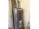 Classic Rheem water heater featuring well-maintained pipes and connections at 1869 Schofield Dr, Hampton, GA 30228