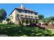 Spacious lawn with lower-level walkout patio and wooden deck on upper level at 4818 Moon Hollow Ct, Buford, GA 30519