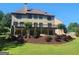 Beautiful backyard with multilevel deck, landscaping, and plenty of open lawn space at 4818 Moon Hollow Ct, Buford, GA 30519