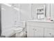 Modern bathroom featuring a tub/shower combo, contemporary vanity, and neutral tones at 4818 Moon Hollow Ct, Buford, GA 30519