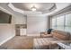 Comfortable bonus room with media center and plenty of space for recreation at 4818 Moon Hollow Ct, Buford, GA 30519