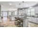 Bright, updated kitchen with an island and breakfast bar seating at 4818 Moon Hollow Ct, Buford, GA 30519