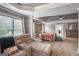 Comfortable main bedroom suite including a lounging area and view to the bedroom at 4818 Moon Hollow Ct, Buford, GA 30519