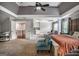 Large primary suite with trey ceilings, a sitting area, and plenty of natural light at 4818 Moon Hollow Ct, Buford, GA 30519
