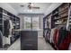 Spacious walk-in closet with shelving and storage for optimal organization at 4818 Moon Hollow Ct, Buford, GA 30519