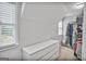 Organized walk-in closet with ample storage space and natural light at 4818 Moon Hollow Ct, Buford, GA 30519