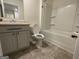 Cozy bathroom featuring a vanity with sink, toilet, and bathtub with shower at 190 Hampton Cir, Mcdonough, GA 30253