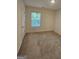 Neutral bedroom with a window that provides natural light at 190 Hampton Cir, Mcdonough, GA 30253
