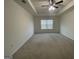 Bright and airy bedroom with neutral carpet and a large window for natural light at 190 Hampton Cir, Mcdonough, GA 30253