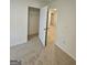 Neutral bedroom with carpet and open closet space at 190 Hampton Cir, Mcdonough, GA 30253