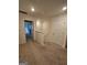 Carpeted hallway leading to multiple rooms at 190 Hampton Cir, Mcdonough, GA 30253