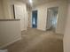 Hallway on second floor with multiple doorways leading to different rooms at 190 Hampton Cir, Mcdonough, GA 30253