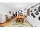 Formal dining room with a large wooden table, chairs, and an ornate rug at 349 Campground Rd, Mcdonough, GA 30253