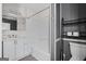 Cozy bathroom with a shower-tub combo, vanity, and storage options at 397 Campground Rd, Mcdonough, GA 30253