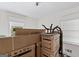 Bright bedroom filled with moving boxes, offering ample space and natural light at 397 Campground Rd, Mcdonough, GA 30253