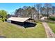 Expansive property with a pavilion for outdoor gatherings and green space at 387 Colvin Dr, Locust Grove, GA 30248