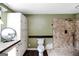 This bathroom showcases a tiled shower, modern toilet, and vanity with storage, combining functionality with style at 387 Colvin Dr, Locust Grove, GA 30248