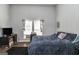 Serene bedroom featuring natural light, comfortable bed, and a cozy atmosphere at 387 Colvin Dr, Locust Grove, GA 30248