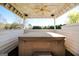 Relaxing covered outdoor hot tub, perfect for unwinding at 387 Colvin Dr, Locust Grove, GA 30248