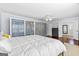 Spacious bedroom boasting ample natural light, large closets, and stylish furnishings at 75 Auburn Rd, Auburn, GA 30011