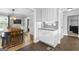 Dining room and built-in hutch with view into the living room at 75 Auburn Rd, Auburn, GA 30011