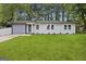 Charming single-story home with a well-maintained lawn and a freshly painted exterior at 1770 Atherton Dr, Decatur, GA 30035