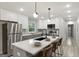 Modern kitchen with stainless steel appliances, a center island, and stylish backsplash at 1770 Atherton Dr, Decatur, GA 30035
