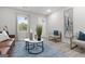 Bright living room featuring hardwood floors, decorative pillows, and natural light at 1770 Atherton Dr, Decatur, GA 30035