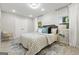 Sunlit main bedroom with neutral tones, plank floors, and a spacious closet at 1770 Atherton Dr, Decatur, GA 30035
