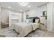 Sunlit main bedroom with neutral tones, plank floors, and a spacious closet at 1770 Atherton Dr, Decatur, GA 30035
