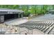 Large outdoor amphitheater offers a spacious seating area surrounded by lush greenery at 407 Blue Smoke Trl, Peachtree City, GA 30269