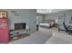 Bedroom featuring decor items, comfortable bed, and TV at 407 Blue Smoke Trl, Peachtree City, GA 30269