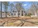 Beautiful two story home with stucco exterior and well-maintained landscaping at 407 Blue Smoke Trl, Peachtree City, GA 30269