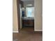 A look into the bathroom featuring a vanity with dark wood cabinets at 3480 Shepherds Path, Decatur, GA 30034