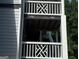 Close-up of the exterior of an apartment building showing unit numbers and balconies at 3480 Shepherds Path, Decatur, GA 30034