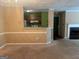 Inviting living room showcases a fireplace and an adjacent kitchen at 3480 Shepherds Path, Decatur, GA 30034