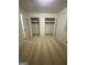 Neutral bedroom featuring carpet and closets with bi-fold doors at 1725 Sara Se Ct, Conyers, GA 30013