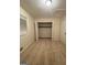 Clean, empty bedroom features a double window and empty closet at 1725 Sara Se Ct, Conyers, GA 30013