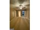 Large carpeted main bedroom with a ceiling fan, attached bathroom, and walk-in closet at 1725 Sara Se Ct, Conyers, GA 30013
