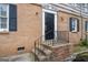 Close up shows brick with door and surrounding siding at 3626 Buford # C1, Brookhaven, GA 30329