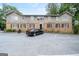 Apartment building shows brick and wood siding with parking spaces at 3626 Buford # C1, Brookhaven, GA 30329