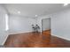 Living room features hardwood floors, modern trim, and an open doorway at 3626 Buford # C1, Brookhaven, GA 30329
