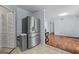 Bright living room with wood floors and view of updated, stainless steel refrigerator at 3626 Buford # C1, Brookhaven, GA 30329