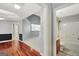 Hallway leading to bathroom with walk-in shower, perfect for convenience at 85 Parks Pl, Sharpsburg, GA 30277