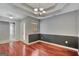 Dining room featuring hardwood floors, a chandelier, and wainscoting, with a window providing natural light at 85 Parks Pl, Sharpsburg, GA 30277