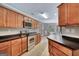Efficient kitchen featuring stainless steel appliances and ample counter space at 85 Parks Pl, Sharpsburg, GA 30277