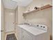 Convenient laundry room features modern appliances and extra storage space at 85 Parks Pl, Sharpsburg, GA 30277