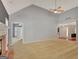 Inviting living room features a fireplace and seamless transition to other living spaces at 85 Parks Pl, Sharpsburg, GA 30277